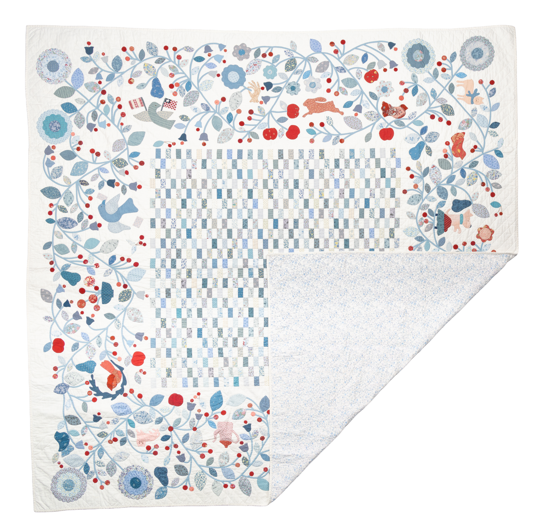 The Goodboy Quilt, a large quilt with a floral vine border, hidden animals and a central checkerboard.